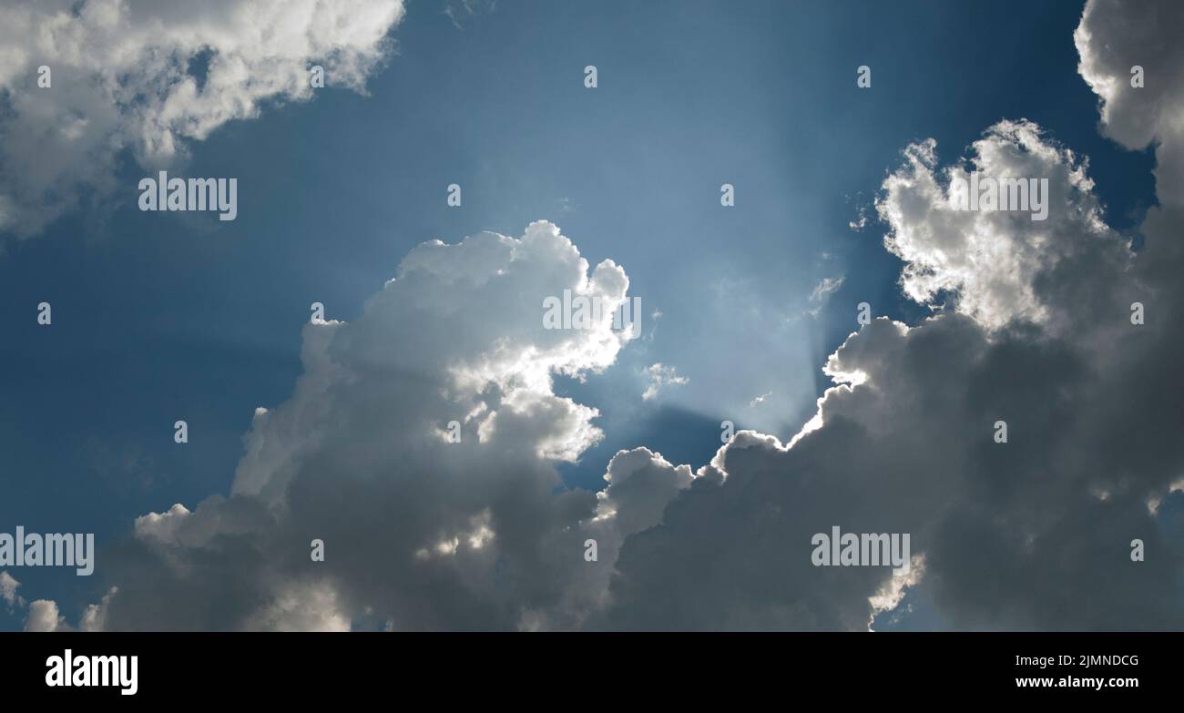 Sun breaking through stormy sky hi-res stock photography and images - Alamy