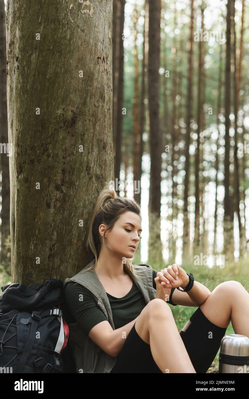 Female hiker sitting in hi-res stock photography and images - Alamy