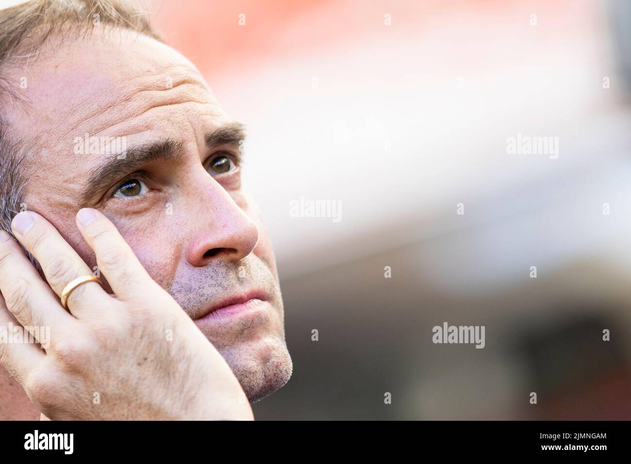07 August 2022, Baden-Wuerttemberg, Stuttgart: Soccer: Bundesliga, VfB Stuttgart - RB Leipzig, Matchday 1, Mercedes-Benz Arena. Leipzig's managing director Oliver Mintzlaff stands in the stadium before the match. Photo: Tom Weller/dpa - IMPORTANT NOTE: In accordance with the requirements of the DFL Deutsche Fußball Liga and the DFB Deutscher Fußball-Bund, it is prohibited to use or have used photographs taken in the stadium and/or of the match in the form of sequence pictures and/or video-like photo series. Stock Photo