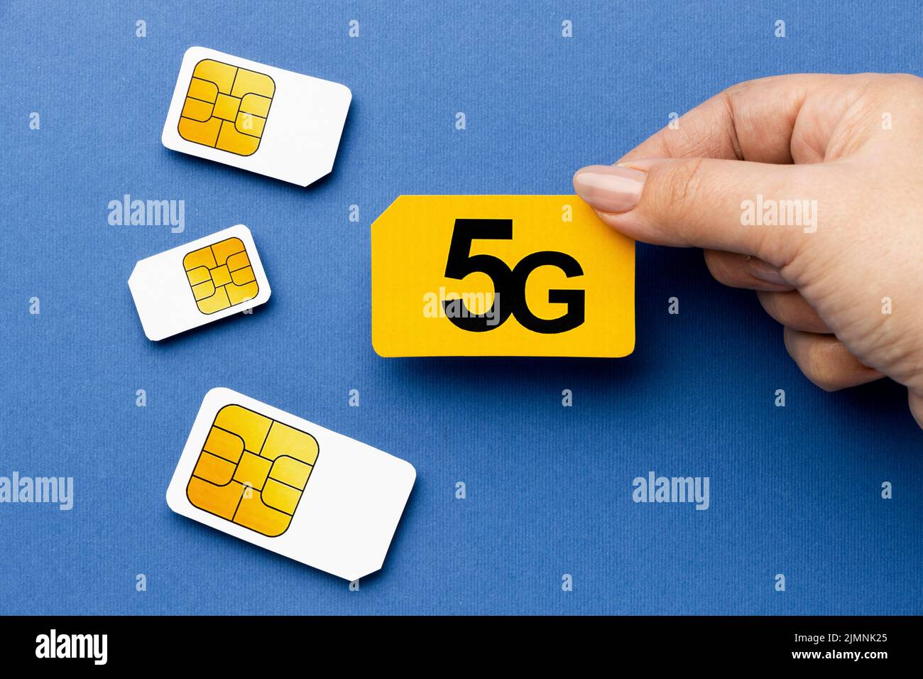 Top view hand holding 5g sim card Stock Photo