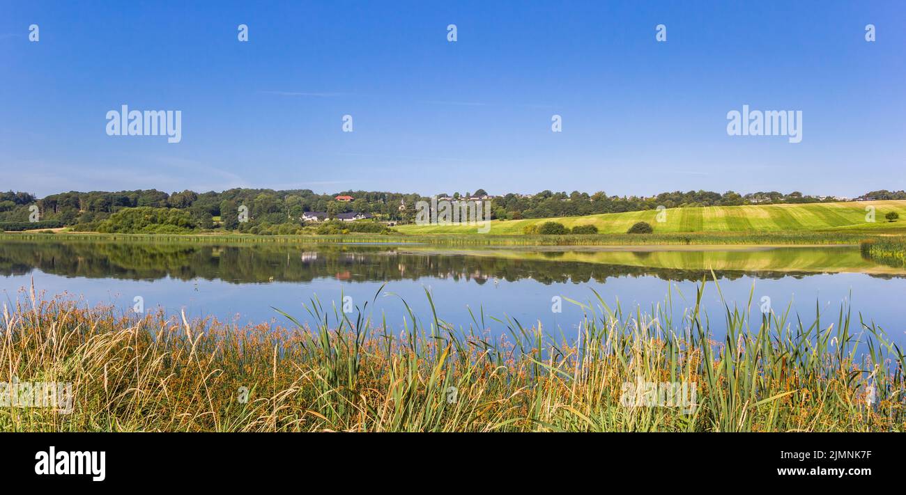 Panorama of a lake in the rolling landscape of Hobro, Denmark Stock Photo