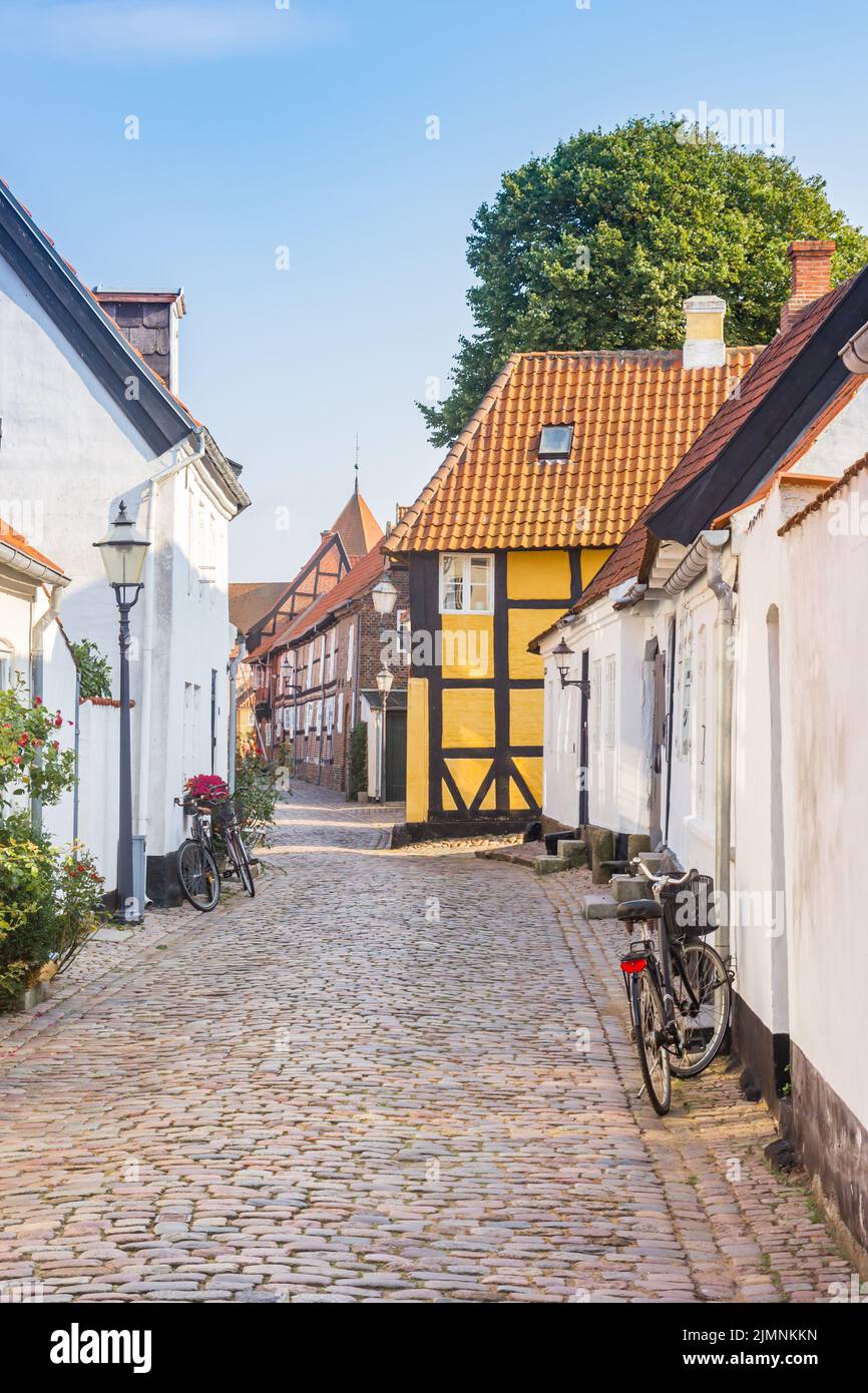 Bicycle in a cobblestoned street in the historic city of Ribe, Denmark Stock Photo