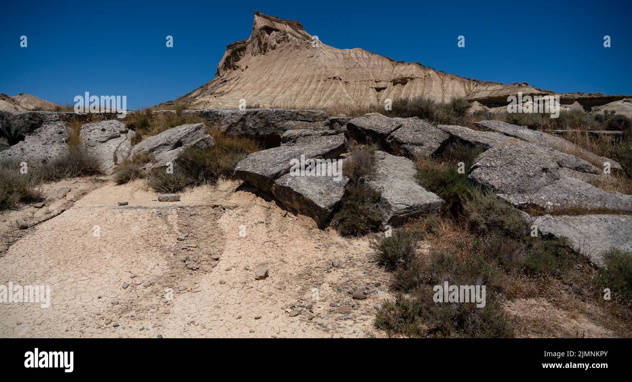 a semidesert natural region or badlands composing clay, chalk and