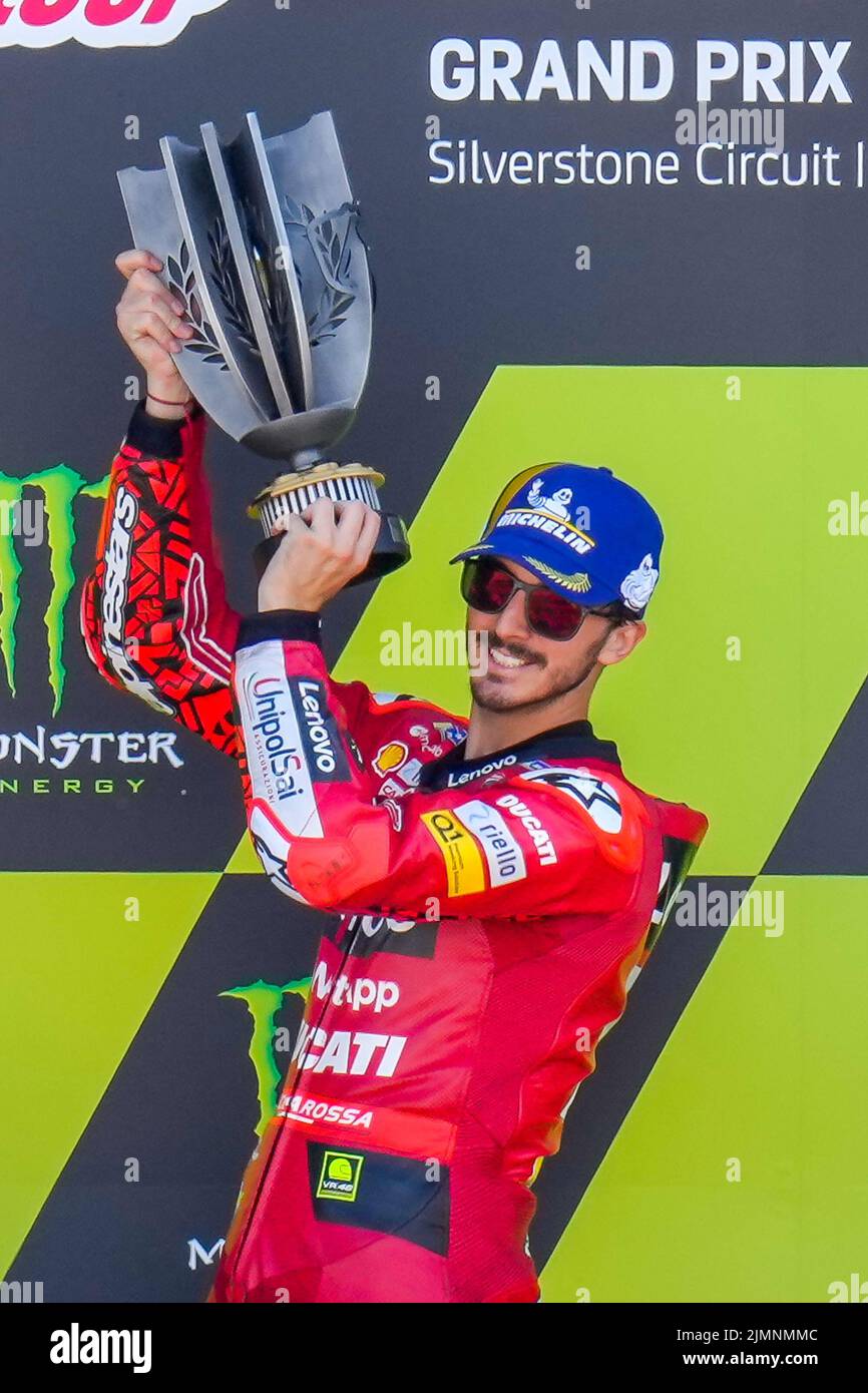 Towcester, UK. 07th Aug, 2022. Francesco BAGNAIA (Italy) of the Ducati Lenova Team celebrates on the podium after winning the 2022 Monster Energy Grand Prix Race at Silverstone Circuit, Towcester, England on the 7th August 2022. Photo by David Horn. Credit: PRiME Media Images/Alamy Live News Stock Photo