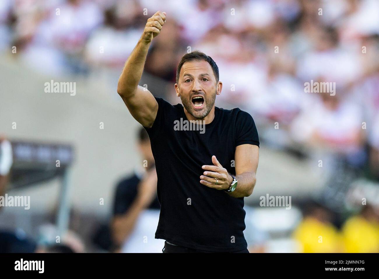 07 August 2022, Baden-Wuerttemberg, Stuttgart: Soccer: Bundesliga, VfB Stuttgart - RB Leipzig, Matchday 1, Mercedes-Benz Arena. Leipzig coach Domenico Tedesco gestures. Photo: Tom Weller/dpa - IMPORTANT NOTE: In accordance with the requirements of the DFL Deutsche Fußball Liga and the DFB Deutscher Fußball-Bund, it is prohibited to use or have used photographs taken in the stadium and/or of the match in the form of sequence pictures and/or video-like photo series. Stock Photo