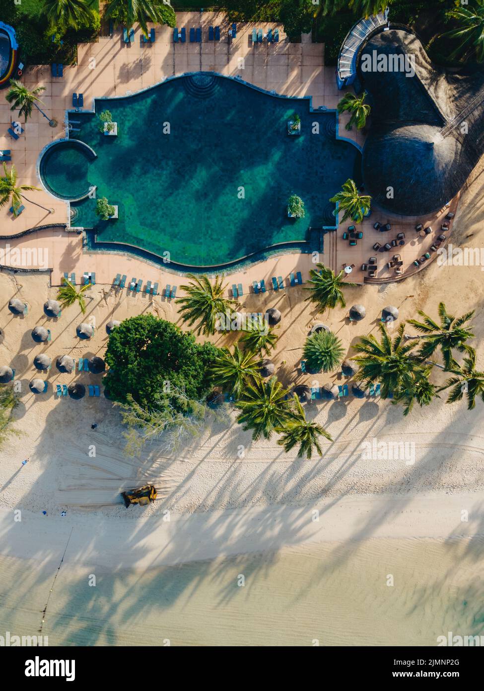 Drone aerial view of tropical resort , tropical resort aerial drone view with pool and ocean Stock Photo