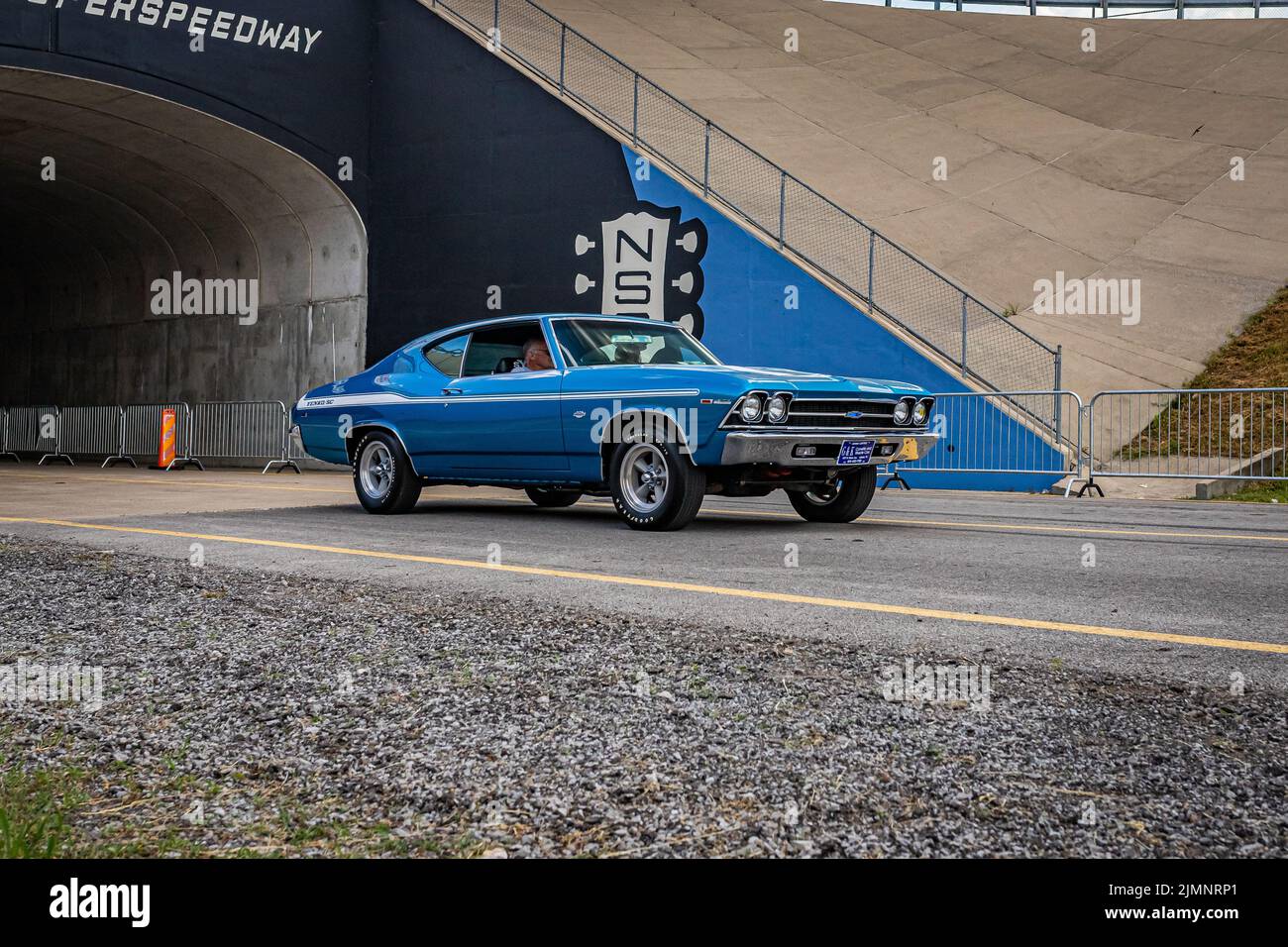 Lebanon, TN - May 14, 2022: Wide angle front corner view of a 1969 Chevrolet Yenko Chevelle Hardtop Coupe driving on a road leaving a local car show. Stock Photo