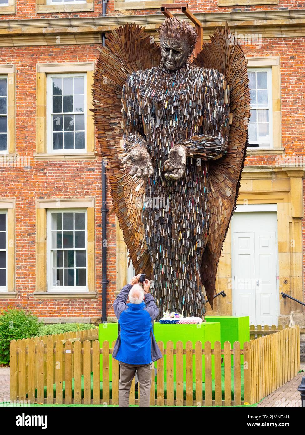 The Knife Angel sculpture by Sculptor Alfie Bradley made from over 100,000 knives handed in to Police combating crime in UK displayed in Kirkleatham R Stock Photo