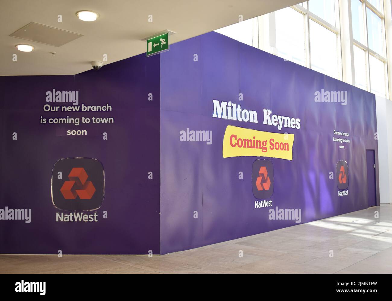 Hoarding in centre:mk shopping centre: Nat West Bank is coming to Milton Keynes soon. Stock Photo
