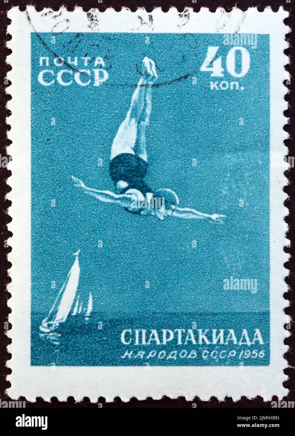 RUSSIA - CIRCA 1956: a stamp printed in Russia shows Diving, All-Union Spartacist Games, Moscow, circa 1956 Stock Photo