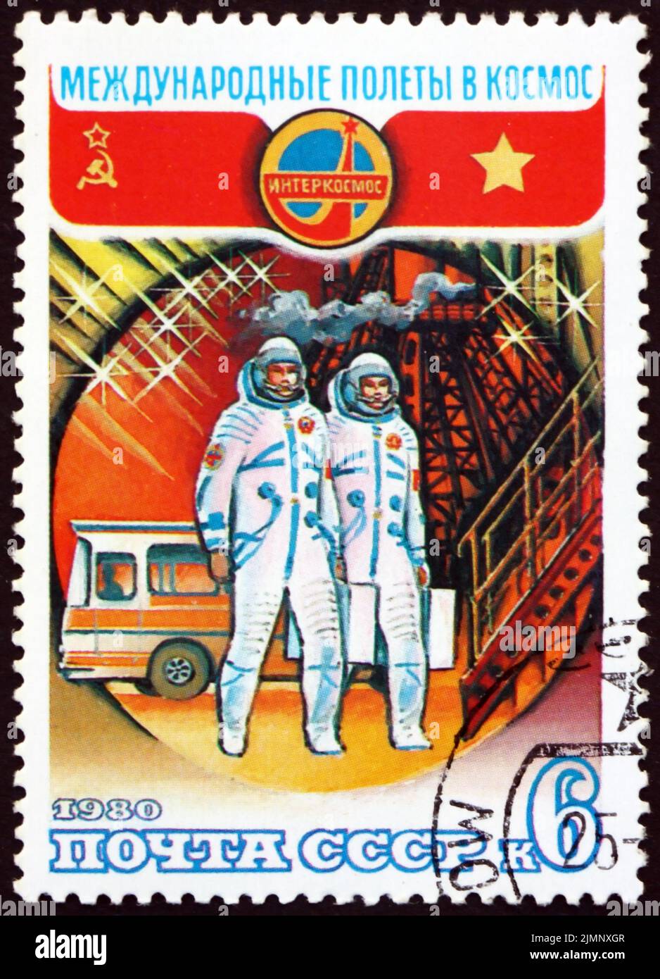 RUSSIA - CIRCA 1980: a stamp printed in Russia shows cosmonauts boarding Soyuz, center for cosmonaut training, 20th anniversary, Intercosmos, circa 19 Stock Photo