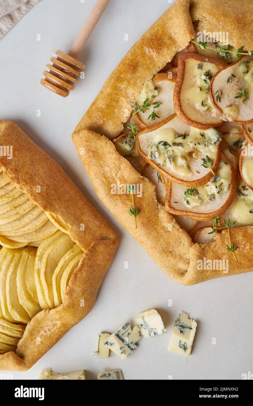 Fruit galette, apple pie with honey, savory pear and cheese pie, marble