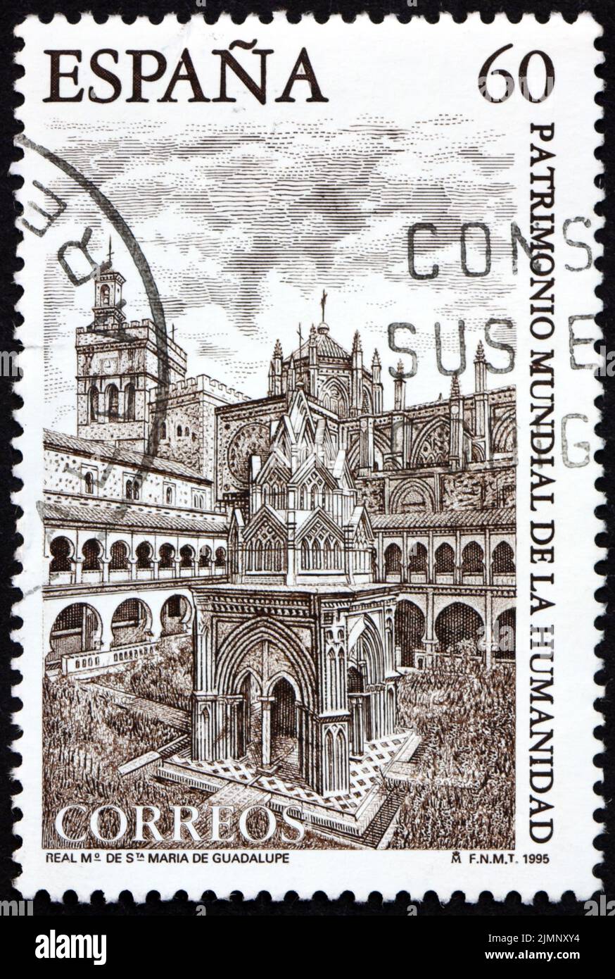 SPAIN - CIRCA 1995: a stamp printed in Spain shows Royal Monastery of Santa Maria de Guadalupe, World Heritage of Humanity, circa 1995 Stock Photo