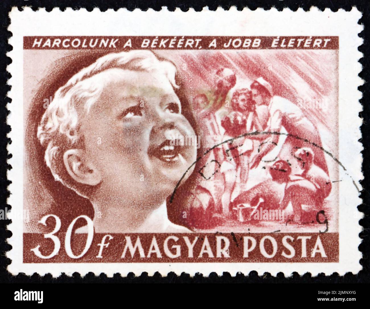 HUNGARY - CIRCA 1950: a stamp printed in Hungary shows boy and children playing, physical culture, International childrens day, circa 1950 Stock Photo