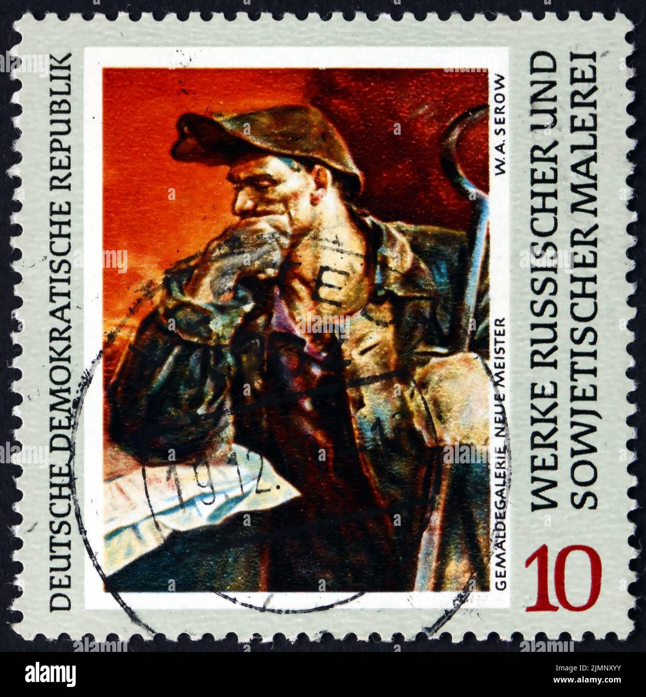 GERMANY - CIRCA 1969: a stamp printed in Germany shows steelworker, painting by V. A. Serov, Russian painter, circa 1969 Stock Photo