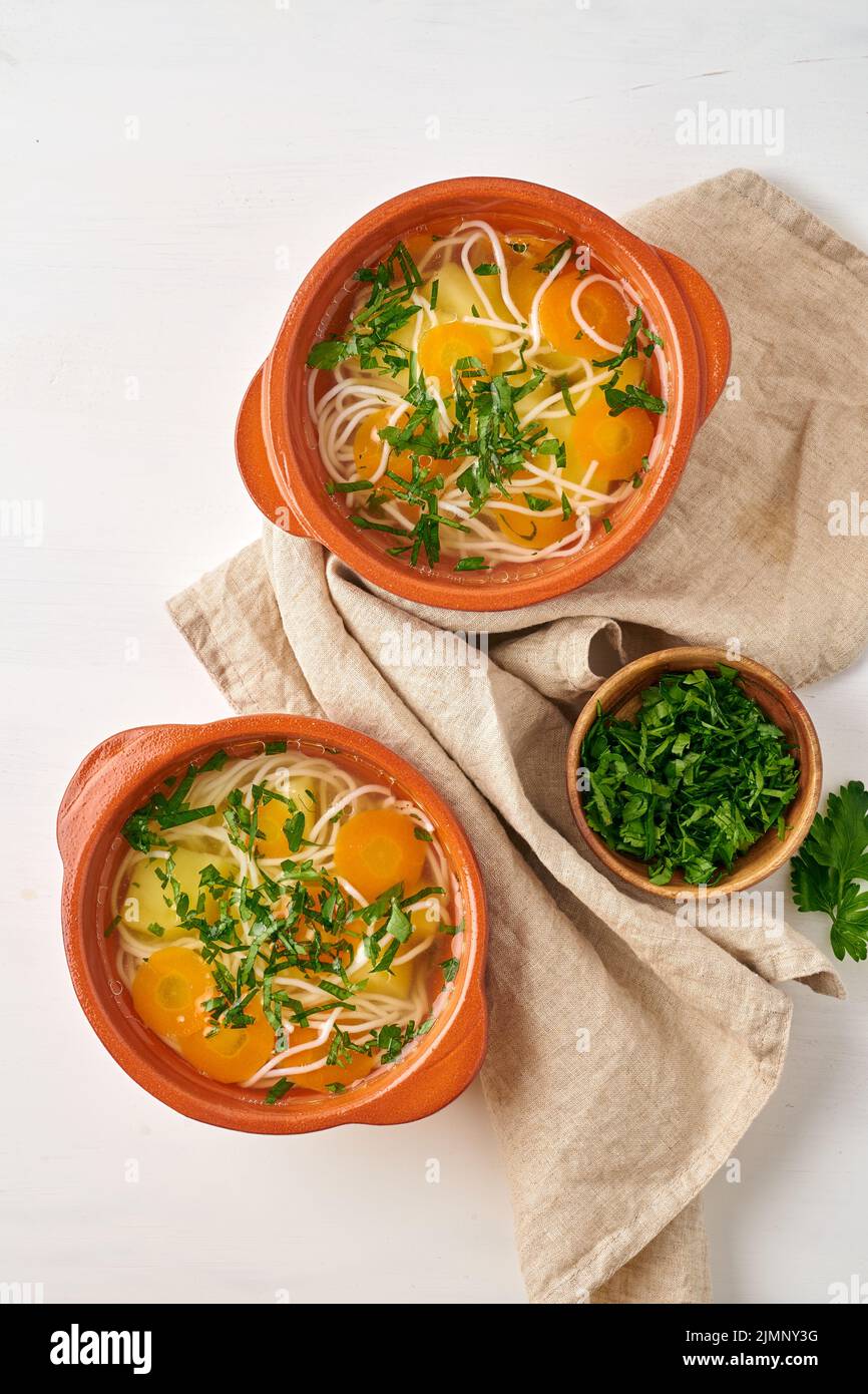 Healthy chicken soup with vegetables and rice noodles, fodmap dash diet