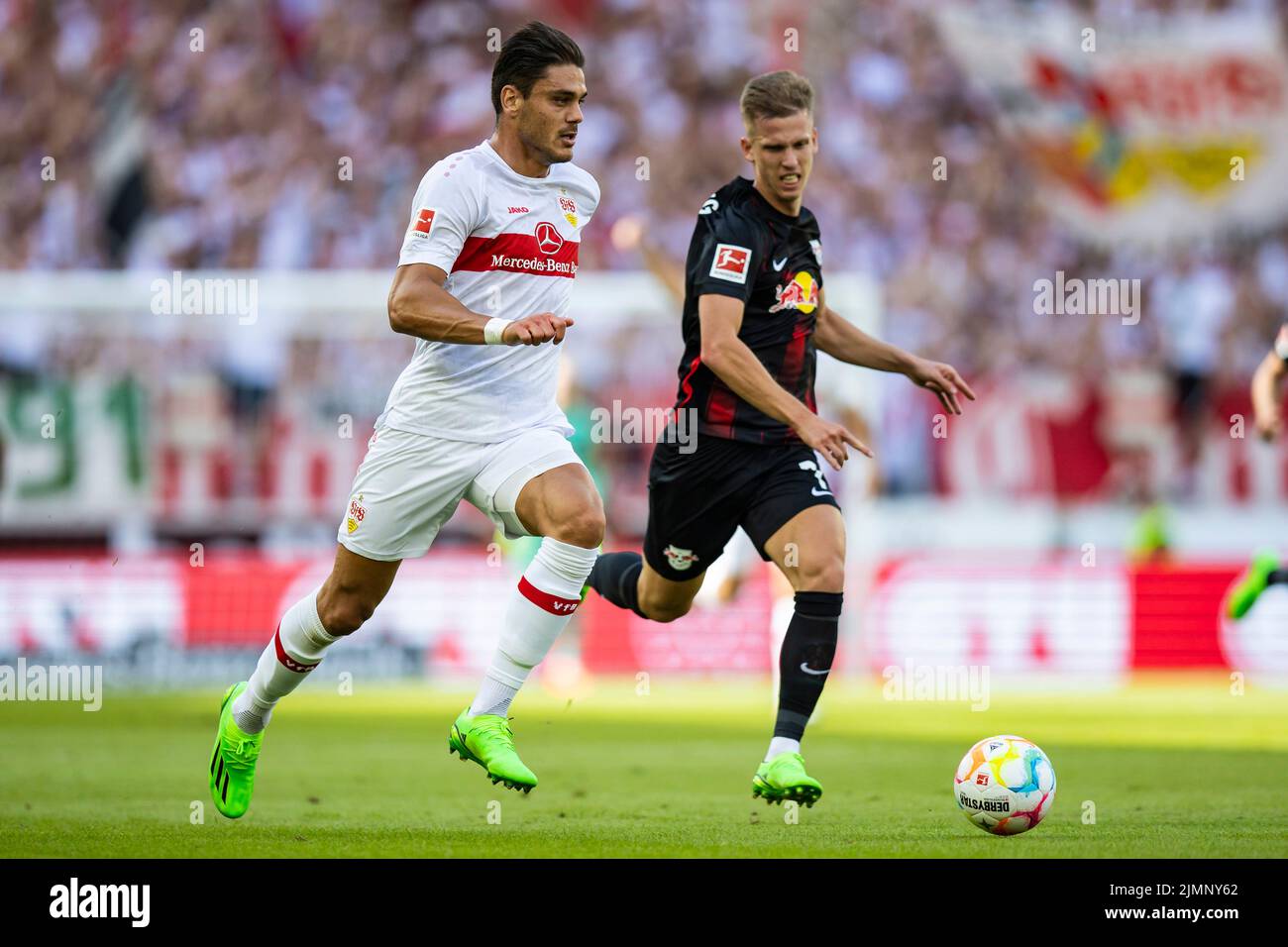 Stuttgart, Germany. 07th Aug, 2022. Soccer: Bundesliga, VfB Stuttgart - RB Leipzig, Matchday 1, Mercedes-Benz Arena. Stuttgart's Konstantinos Mavropanos (l) in action against Leipzig's Dani Olmo. Credit: Tom Weller/dpa - IMPORTANT NOTE: In accordance with the requirements of the DFL Deutsche Fußball Liga and the DFB Deutscher Fußball-Bund, it is prohibited to use or have used photographs taken in the stadium and/or of the match in the form of sequence pictures and/or video-like photo series./dpa/Alamy Live News Stock Photo