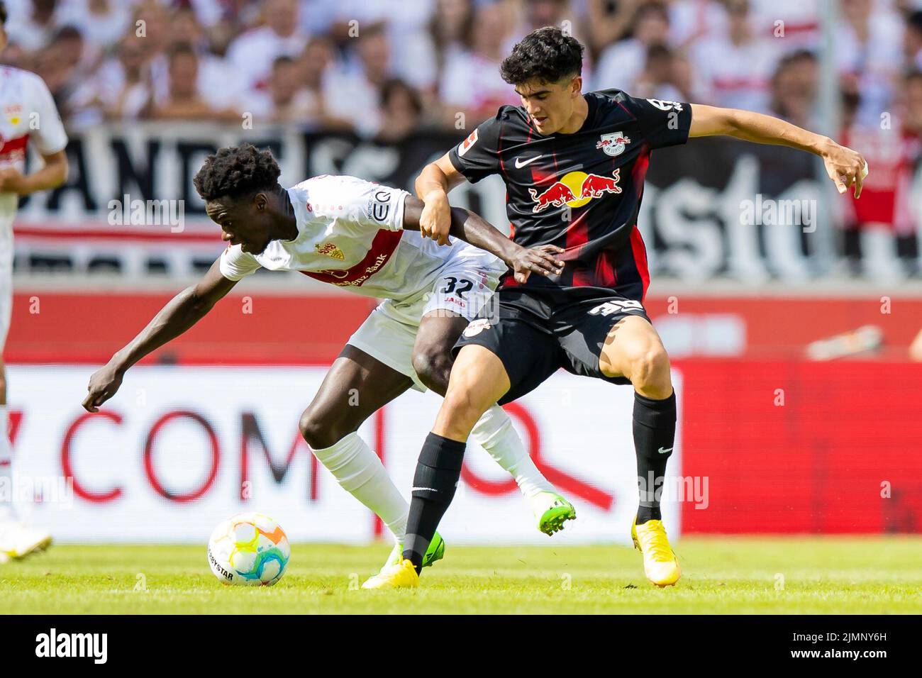 Stuttgart, Germany. 07th Aug, 2022. Soccer: Bundesliga, VfB Stuttgart - RB Leipzig, Matchday 1, Mercedes-Benz Arena. Stuttgart's Naouirou Ahamada (l) in action against Leipzig's Hugo Novoa (r). Credit: Tom Weller/dpa - IMPORTANT NOTE: In accordance with the requirements of the DFL Deutsche Fußball Liga and the DFB Deutscher Fußball-Bund, it is prohibited to use or have used photographs taken in the stadium and/or of the match in the form of sequence pictures and/or video-like photo series./dpa/Alamy Live News Stock Photo