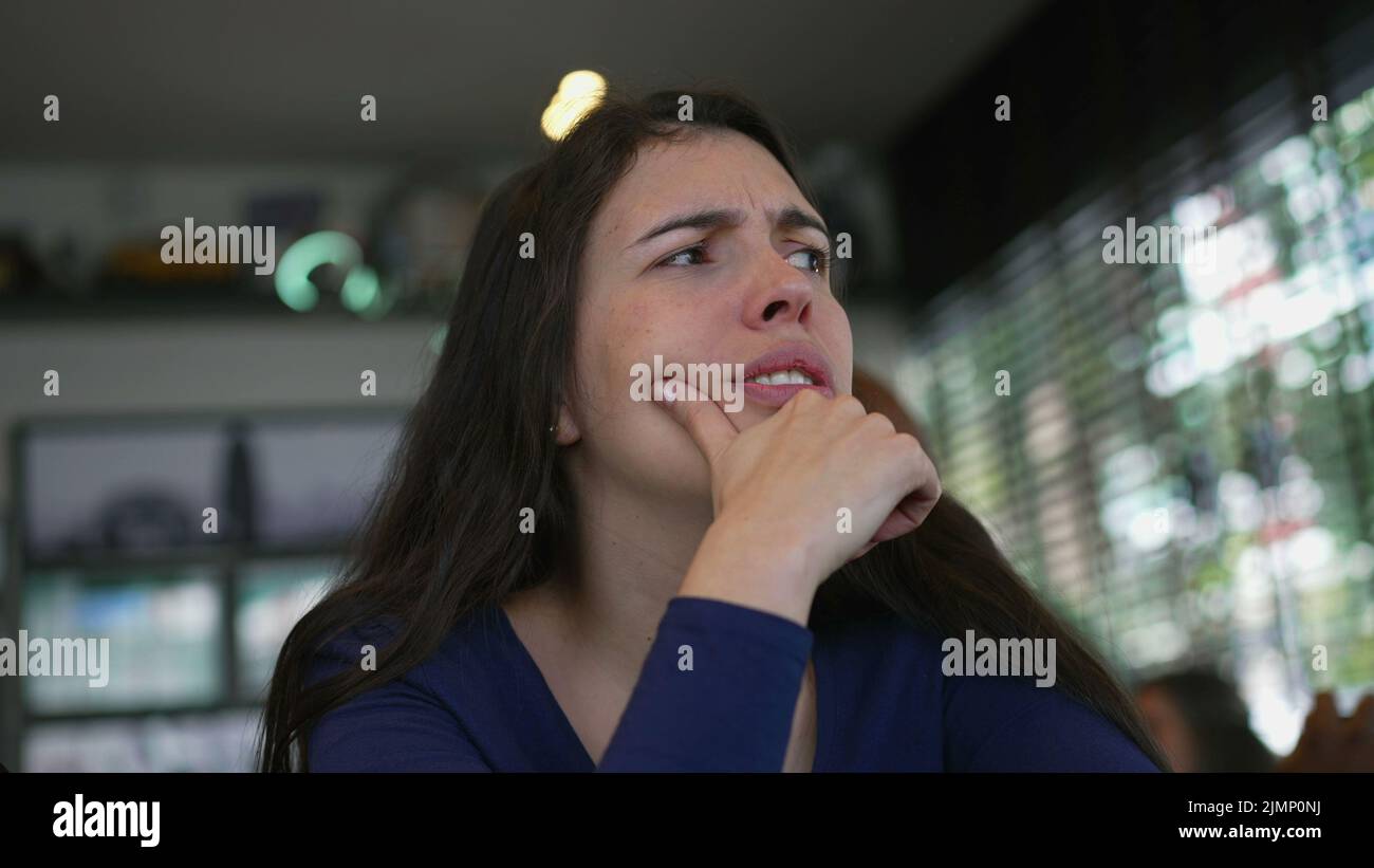 Woman preoccupied emotion closeup face hi-res stock photography and ...