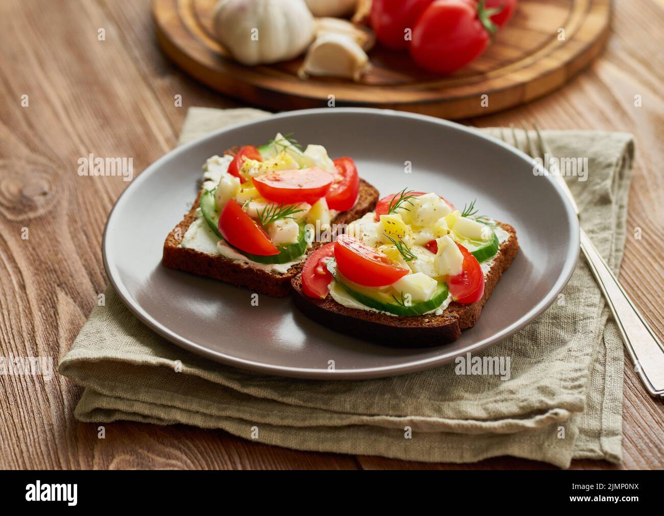Smorrebrod - traditional Danish sandwiches. Black rye bread with boiled ...