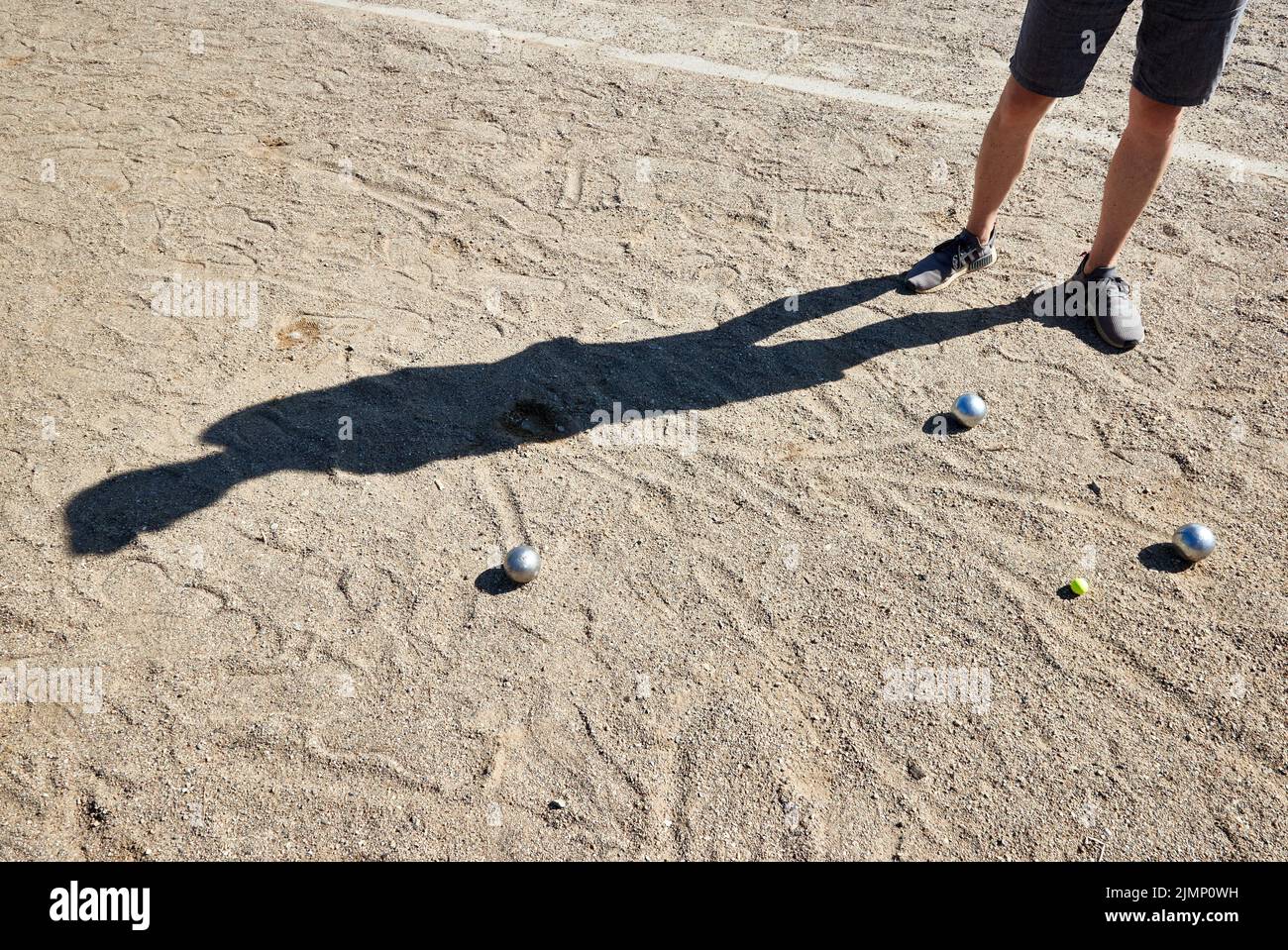 07 August 2022, Schleswig-Holstein, Lübeck: Boule balls lie in the sand. The Holstentor tournament is considered the largest German boules tournament. Photo: Georg Wendt/dpa Stock Photo