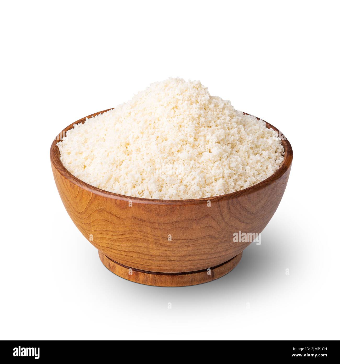 Wooden bowl full of almond flour isolated on white Stock Photo
