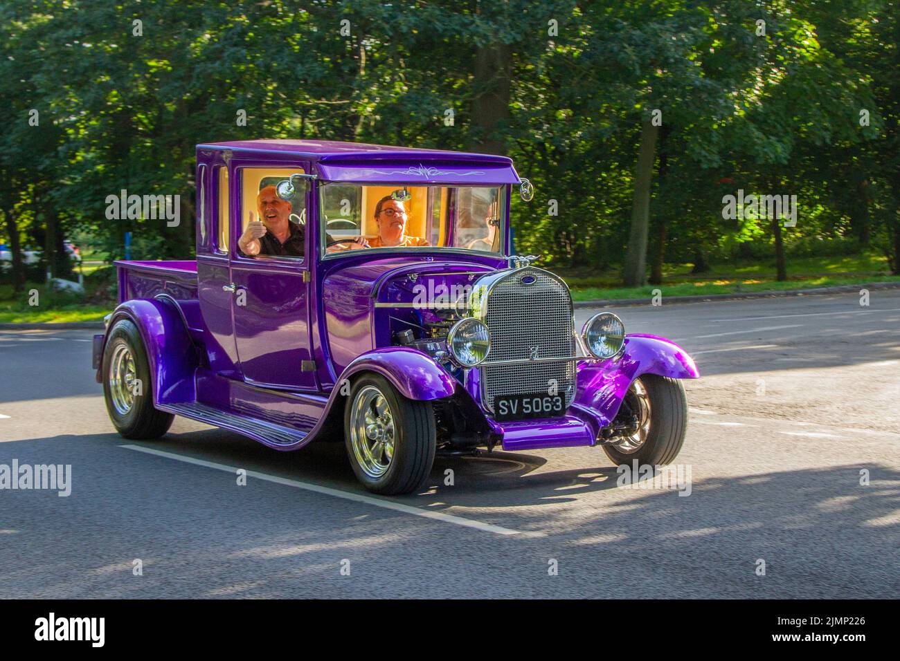 1929, 20s, twenties CUSTOM Iridescent Purple FORD 5022cc Petrol; en-route to Lytham Hall classic car show, Lancashire, UK Stock Photo