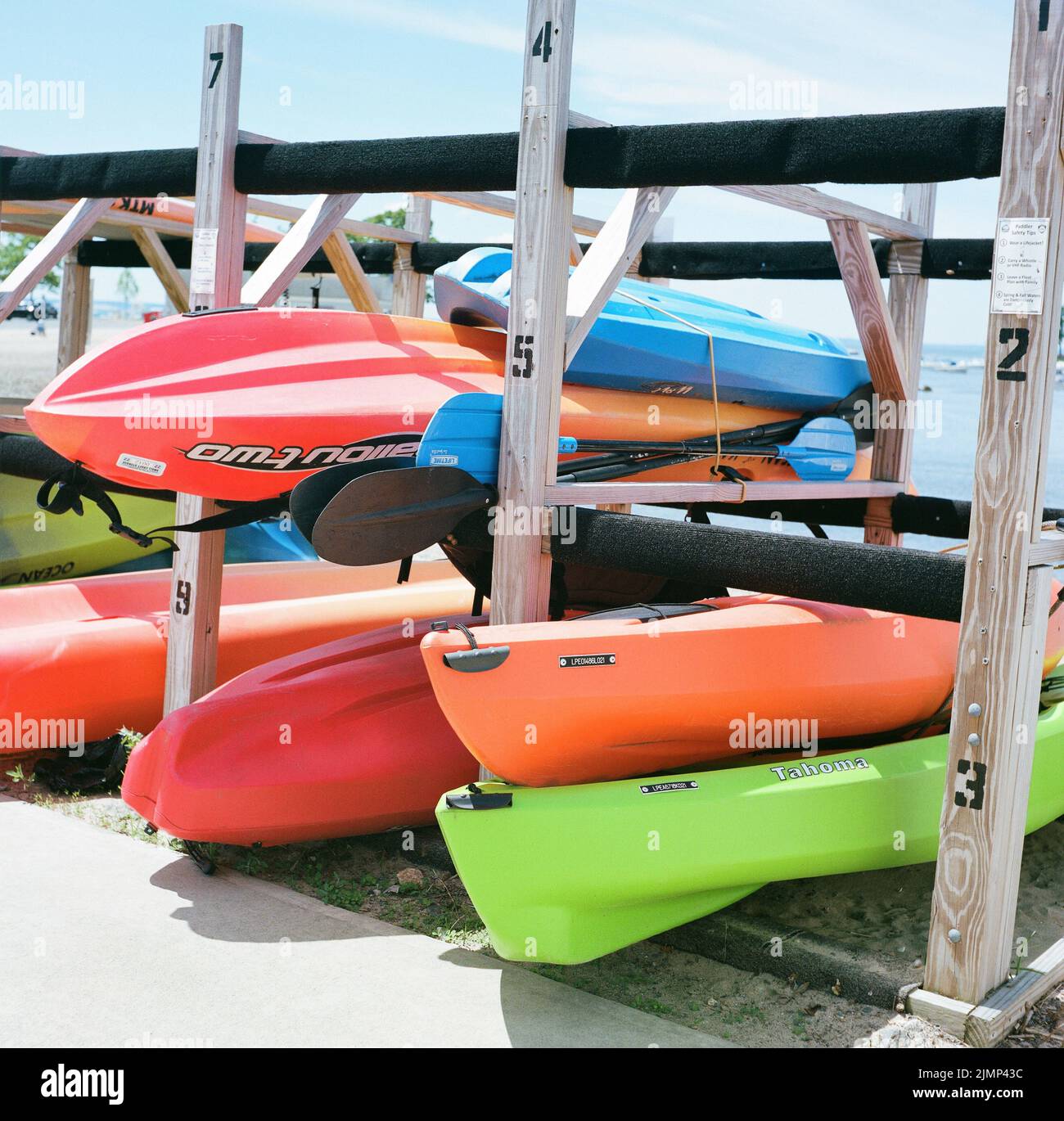 Colorful kayaks on rack hires stock photography and images Alamy