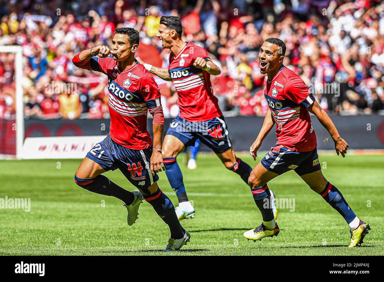 LILLE, FRANCE - AUGUST 7: Benjamin Andre of Lille, Akim Zedadka of Lille celebrate a goal during the French Ligue 1 match between Lille and Auxerre at Stade Pierre Mauroy on August 7, 2022 in Lille, France (Photo by Matthieu Mirville/Orange Pictures) Stock Photo