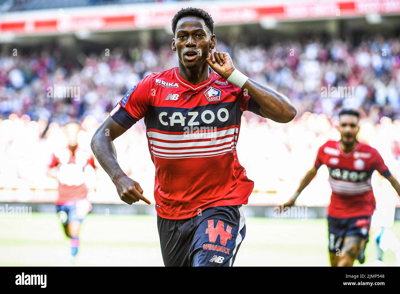 LILLE, FRANCE - AUGUST 7: Jonathan David of Lille celebrates a goal during the French Ligue 1 match between Lille and Auxerre at Stade Pierre Mauroy on August 7, 2022 in Lille, France (Photo by Matthieu Mirville/Orange Pictures) Stock Photo
