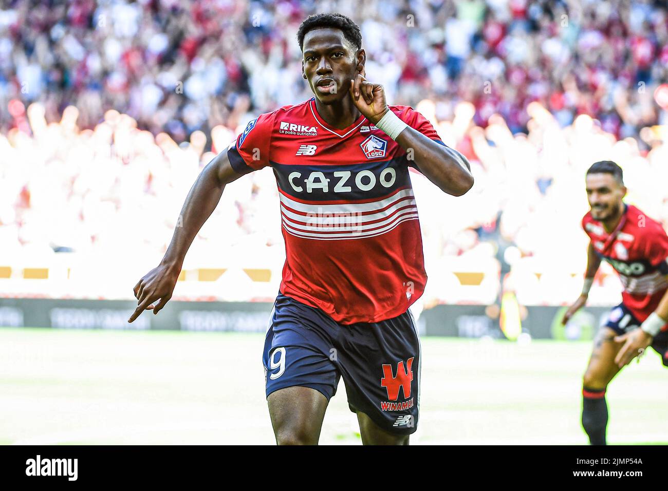 LILLE, FRANCE - AUGUST 7: Jonathan David of Lille celebrates a goal during the French Ligue 1 match between Lille and Auxerre at Stade Pierre Mauroy on August 7, 2022 in Lille, France (Photo by Matthieu Mirville/Orange Pictures) Stock Photo