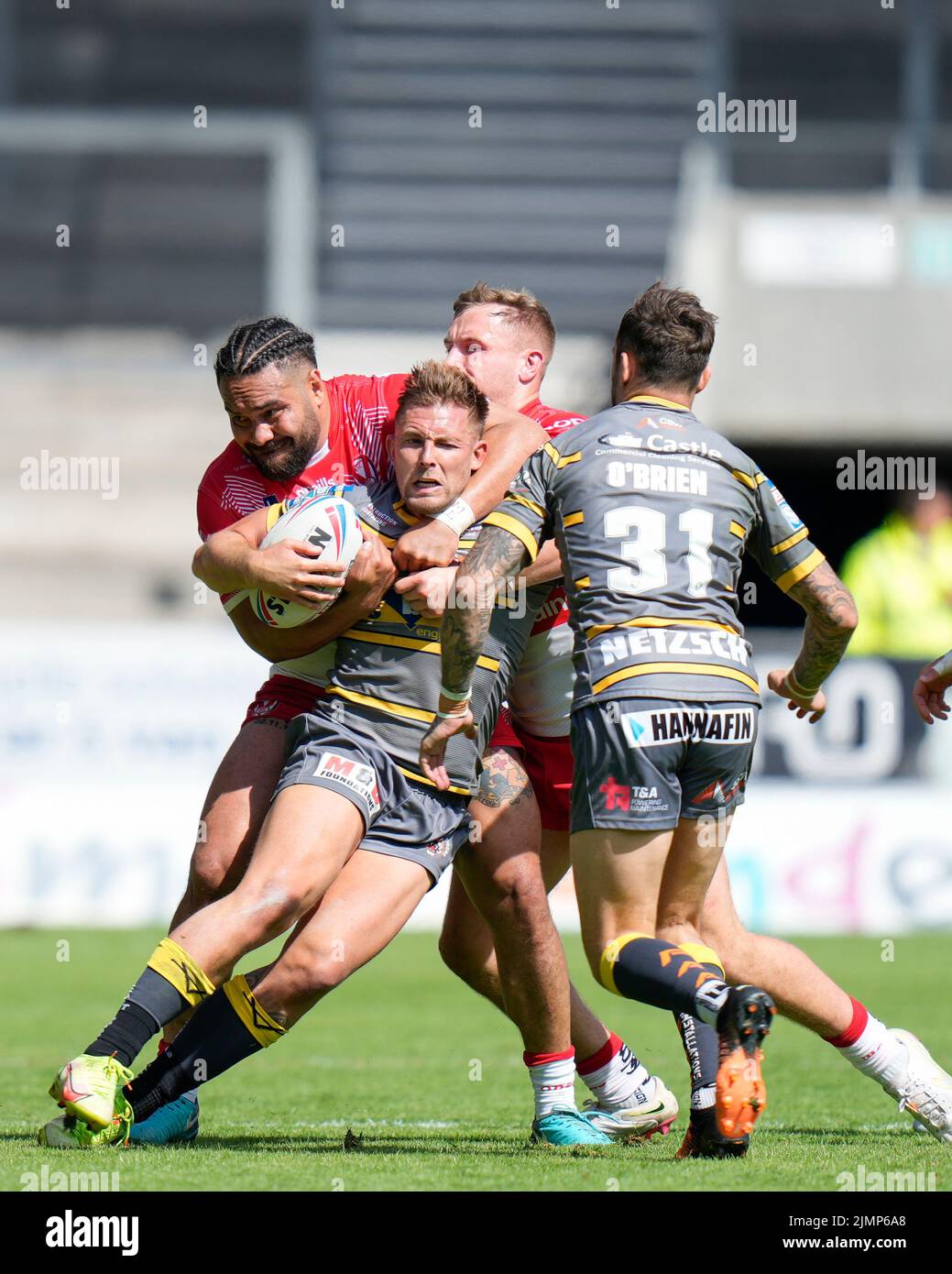 Konrad Hurrell 23 of St Helens tackles Greg Eden 23 of Castleford