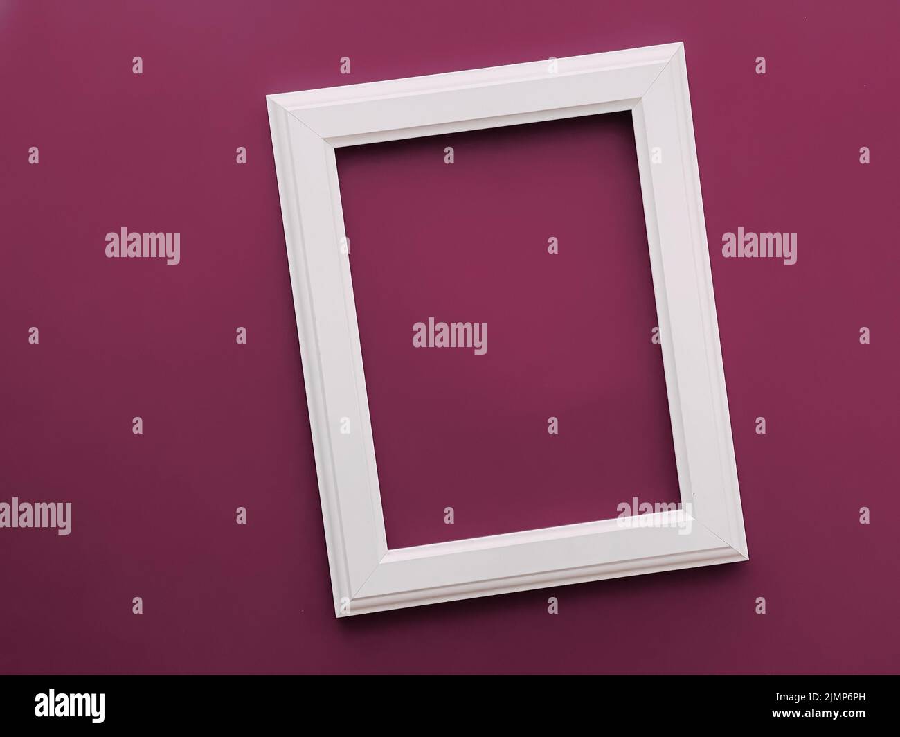 White vertical art frame on purple background as flatlay design, artwork print or photo album Stock Photo