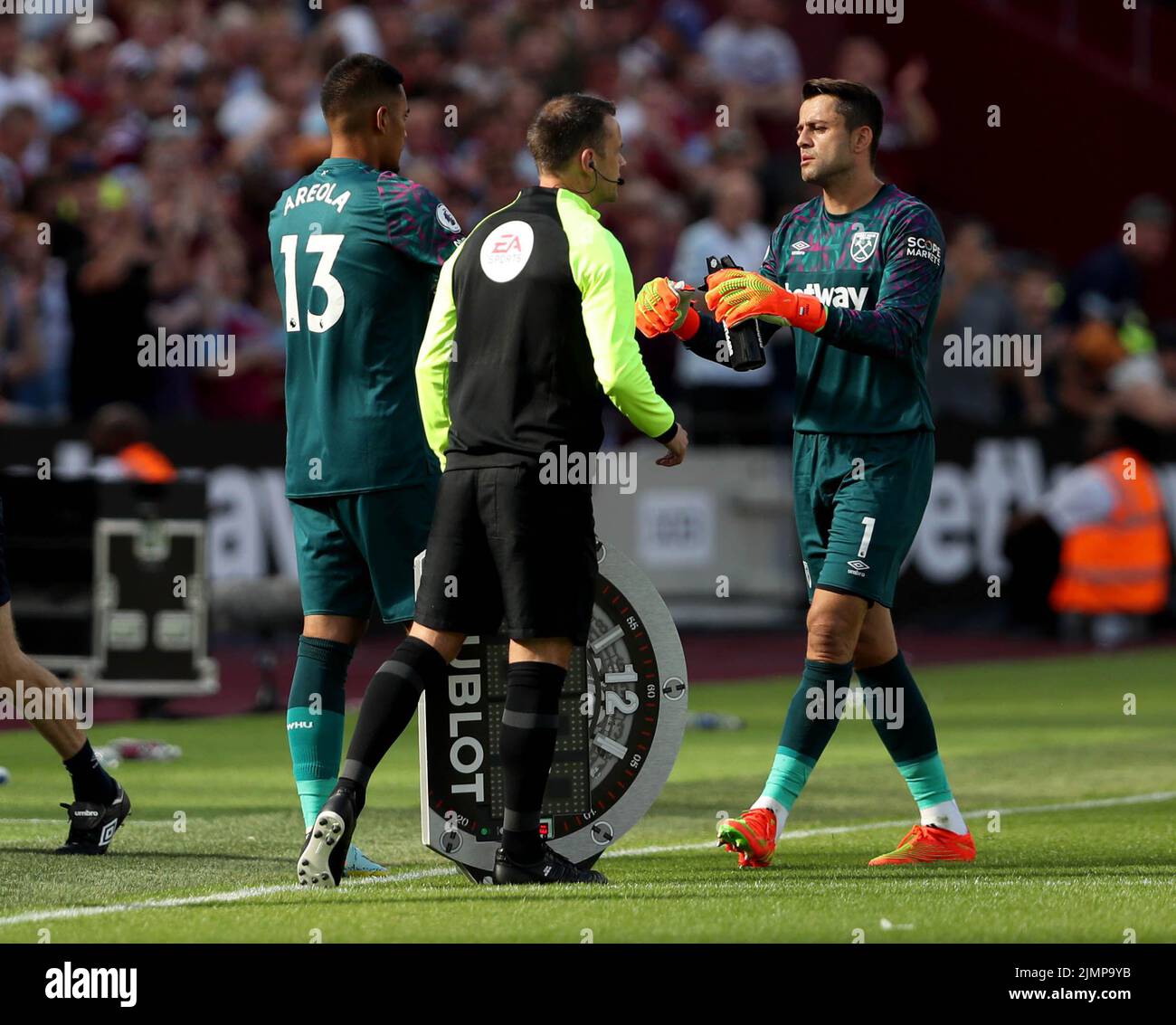 West Ham United goalkeeper Lukasz Fabianski (right) is replaced by goalkeeper Alphonse Areola