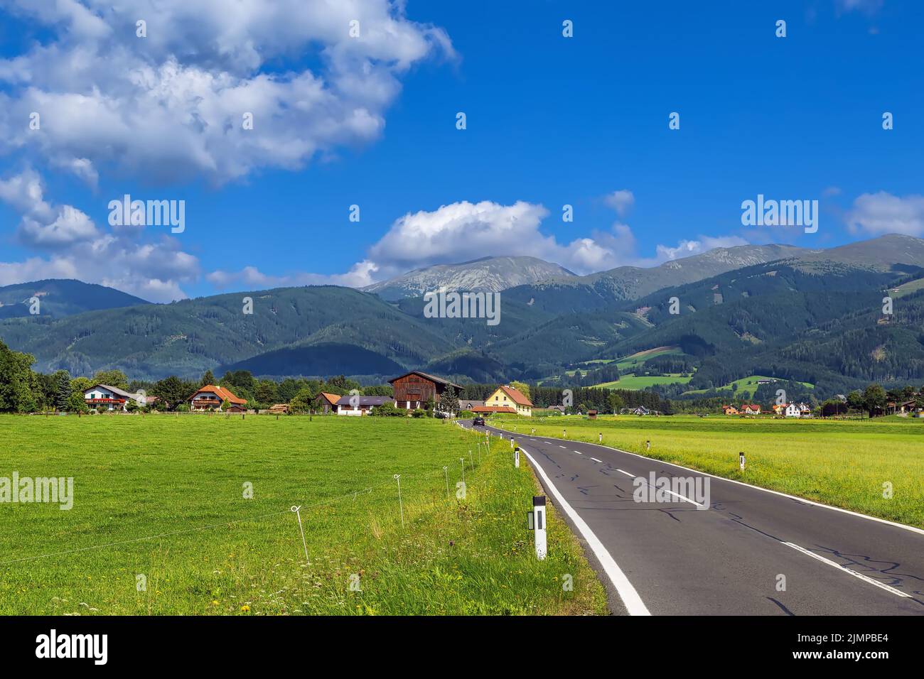 View of fields and Alps, Austria Stock Photo