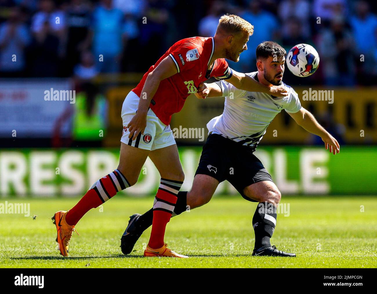 Derby County's Eiran Cashin and Charlton Athletic Jayden Stockley in action during the Sky Bet League One match at The Valley, London. Picture date: Saturday August 6, 2022. Stock Photo