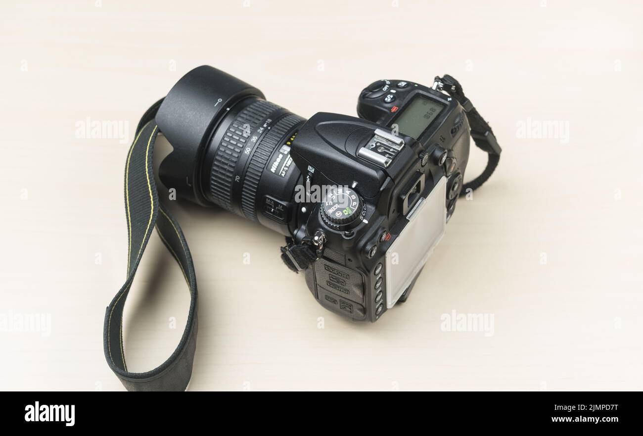 Nikon D7000 digital camera with attached 18-80mm zoom lens, view from above Stock Photo