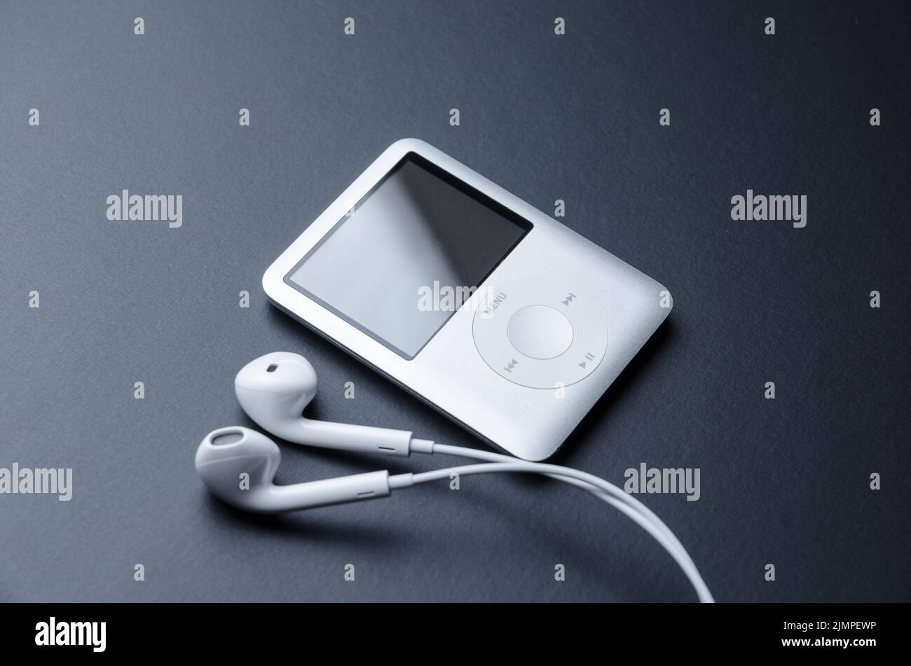 Apple iPod nano 3rd Generation with EarPods on dark background Stock Photo Alamy