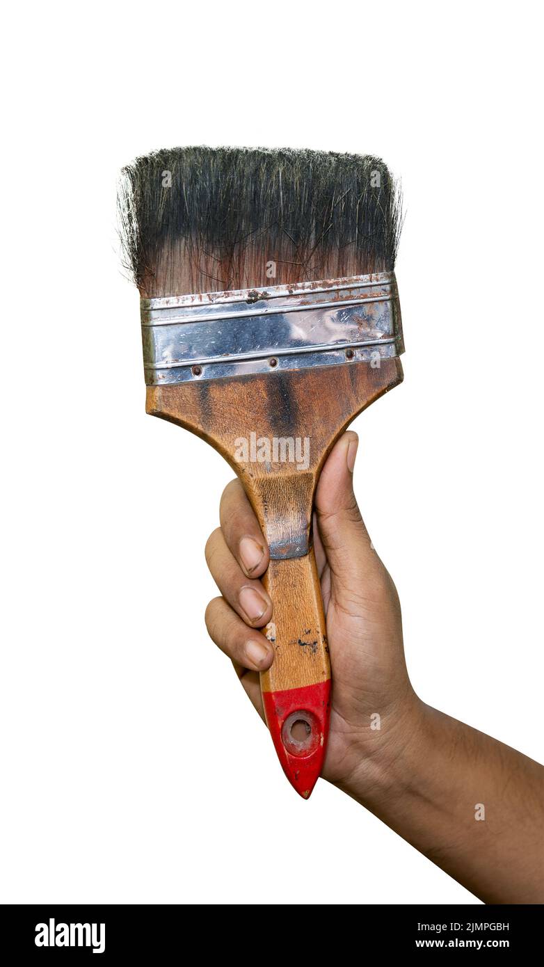 Old used flat paint brush with rust and paint marks isolated on white