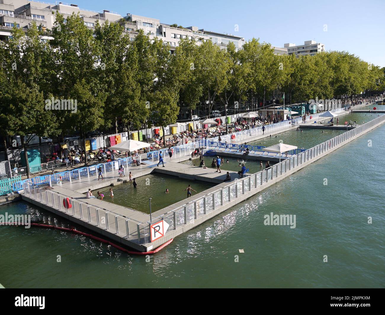 The free swimming pool installed in summer on the Bassin de la Vilette, north of Paris, during Paris-Plage Stock Photo