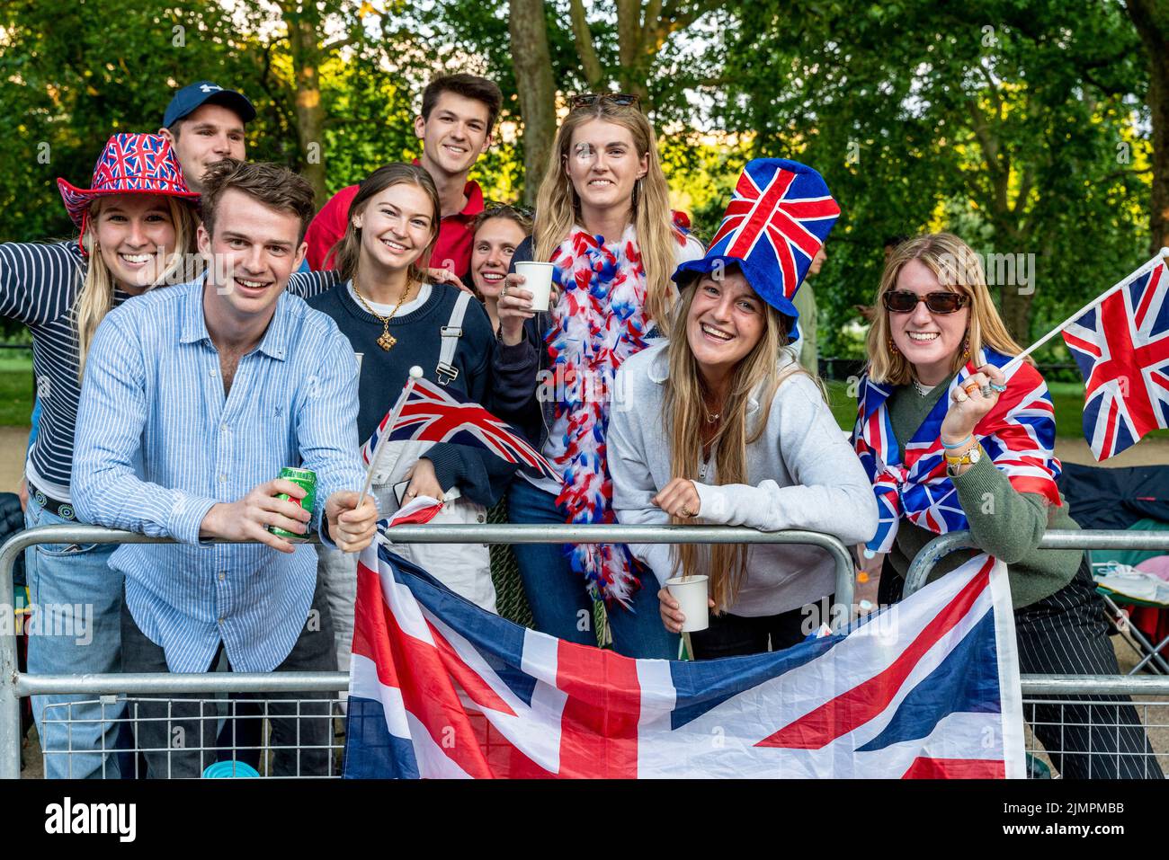 A Group Of Young British People Camp Overnight On The Mall For A Good Viewing Spot To Watch The Queen's Birthday Parade, London, UK. Stock Photo