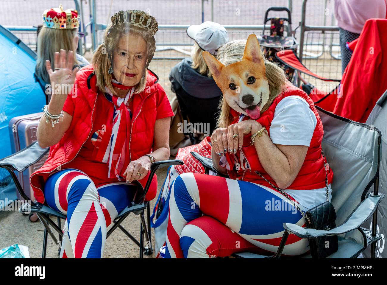 People In Fancy Dress Camp Out Overnight In The Mall For A Good Vantage Spot Before The Queen's Birthday Parade, London, UK. Stock Photo