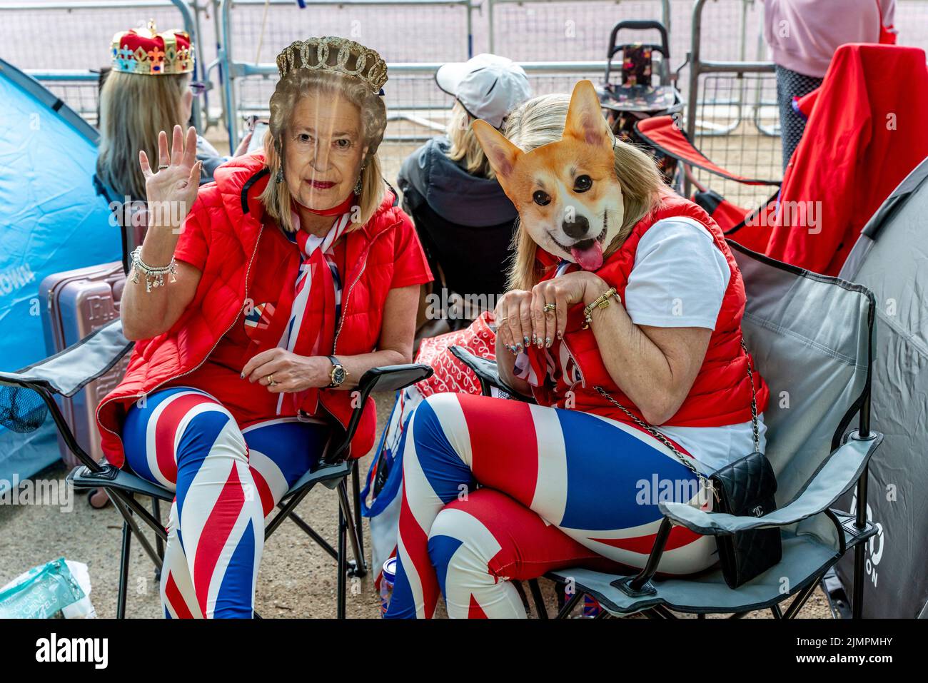 People In Fancy Dress Camp Out Overnight In The Mall For A Good Vantage Spot Before The Queen's Birthday Parade, London, UK. Stock Photo