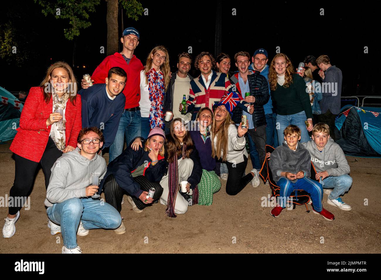 A Group Of Young British People Camp Out Overnight In The Mall For A Good Vantage Spot To See The Queen's Birthday Parade, London, UK. Stock Photo