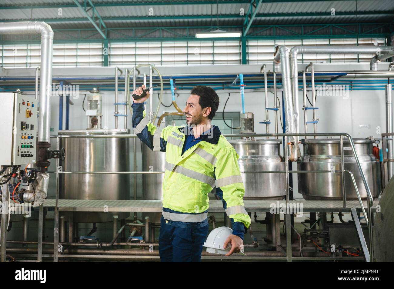 Happy successful of caucasian technician engineer man in safety uniform