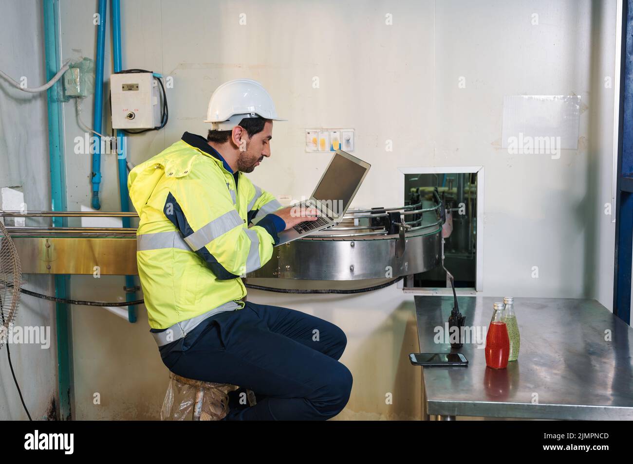 Caucasian engineer man in safety uniform checking and reporting quality