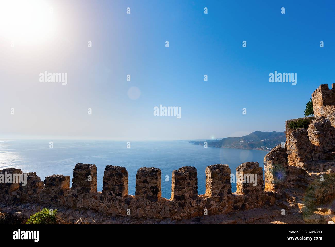 View of the Mediterranean Sea from the ruins of an old stone wall in Alanya Stock Photo