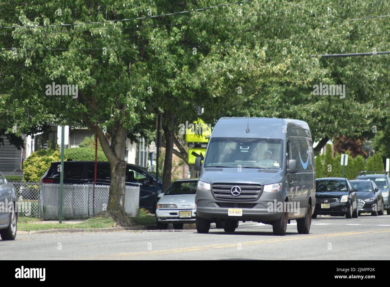 New York, NY, USA. 7th Aug, 2022. (NEW) Amazon sprinter vehicle drives through a local neighborhood. August 7, 2022, New York, USA: Amazon sprinter vehicle drives through a local neighborhood in New York, NY. Amazon.com, Inc. is an American multinational technology company which focuses on e-commerce, cloud computing, digital streaming, and artificial intelligence. It has been referred to as ''one of the most influential economic and cultural forces in the world'', and is one of the world's most valuable brands. Amazon is potentially working on an acquisition of One Medical. Amazon (AMZN) is Stock Photo