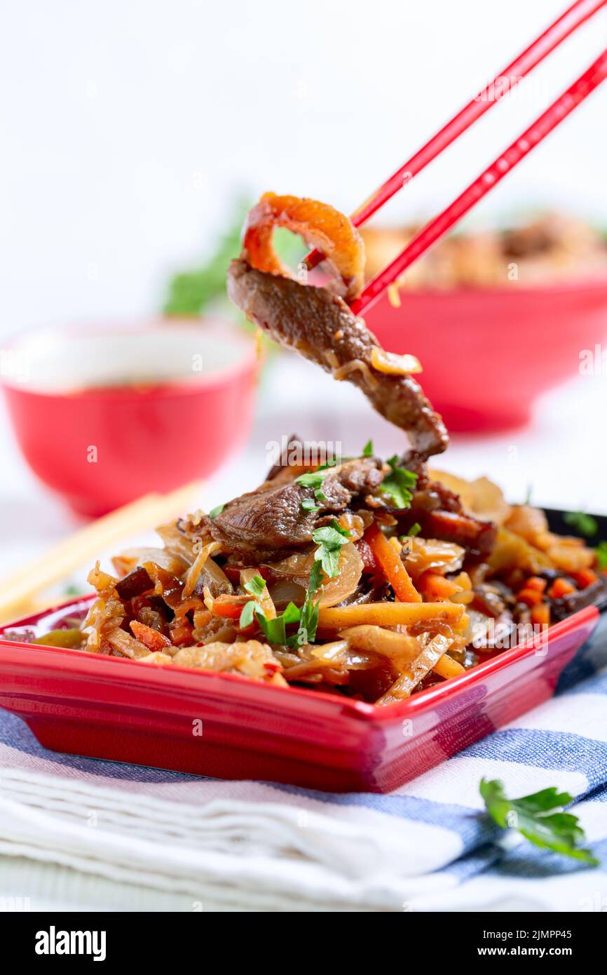 Chinese vegetable mixture and pork in spicy sauce. Stock Photo