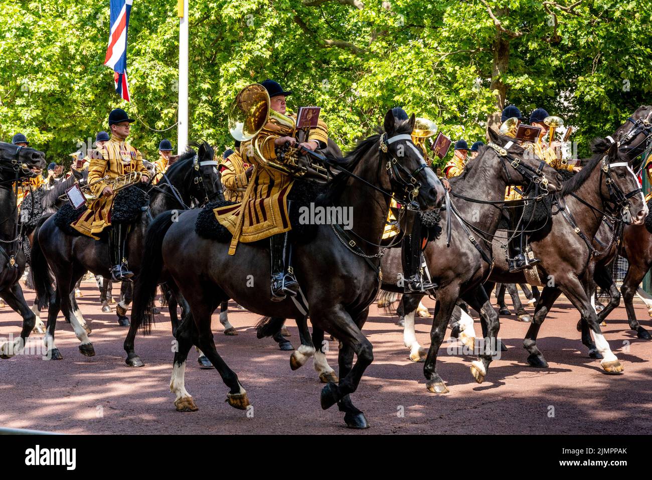 British Army Musicians On Horseback Take Part In The Queen's Birthday Parade By Riding Along The Mall To Horse Guards Parade For The Trooping The Colo Stock Photo